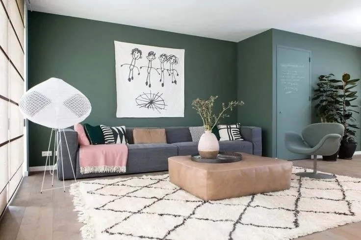 green living room with white rug