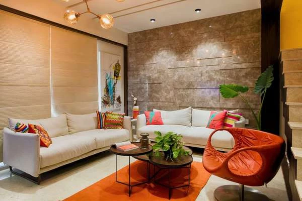 natural tone living room with tangerine orange