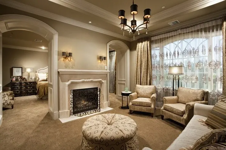 Fireplace separate sitting area and bedroom