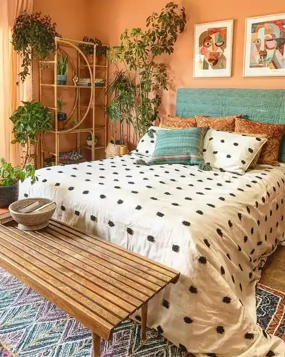 boho bedroom with clay orange with off-white and moss green
