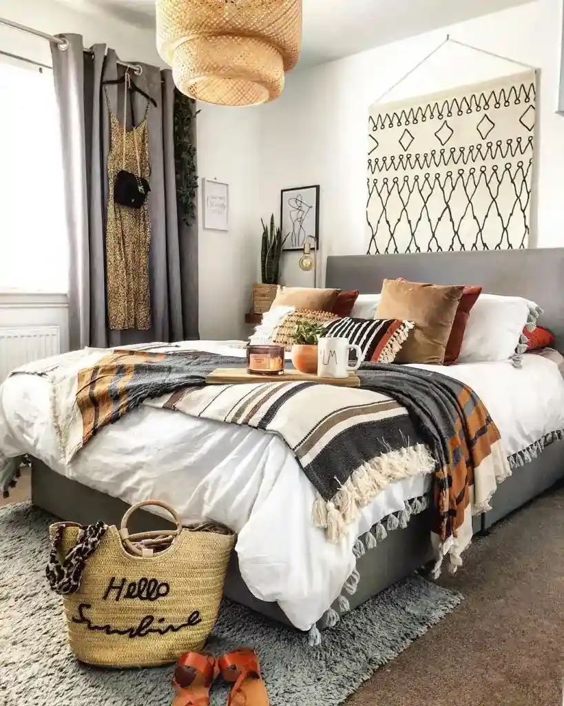 boho bedroom with mix of brown orange white and grey
