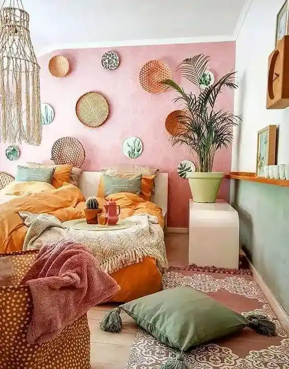 boho bedroom with pink victorian pattern wallpaper
