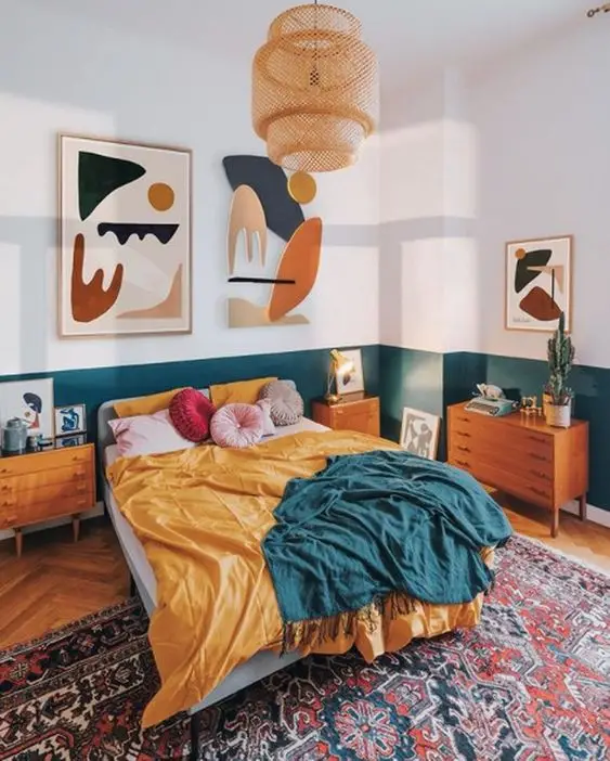 boho bedroom with teal and ochre color scheme
