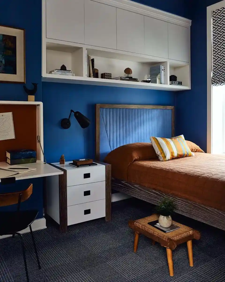teen boy bedroom with blue walls and single bed