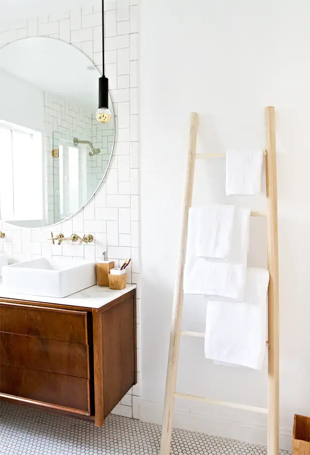 ladder towel rack in small bathroom