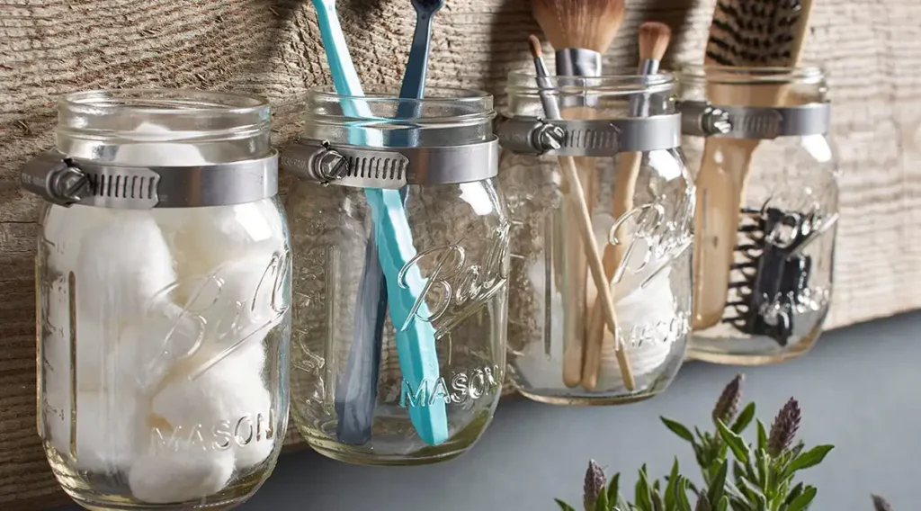 mason jar organizer in a mobile home bathroom