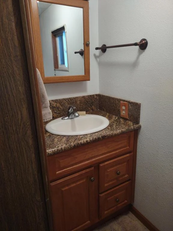 mirror cabinet in a mobile home bathroom