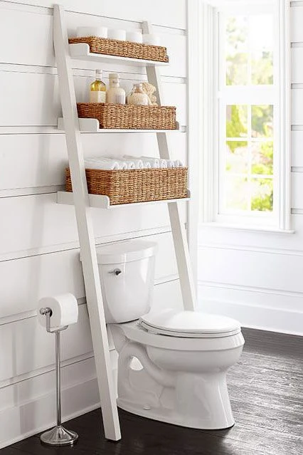over the toilet storage in small bathroom