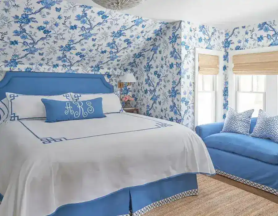 bedroom with blue floral wallpaper