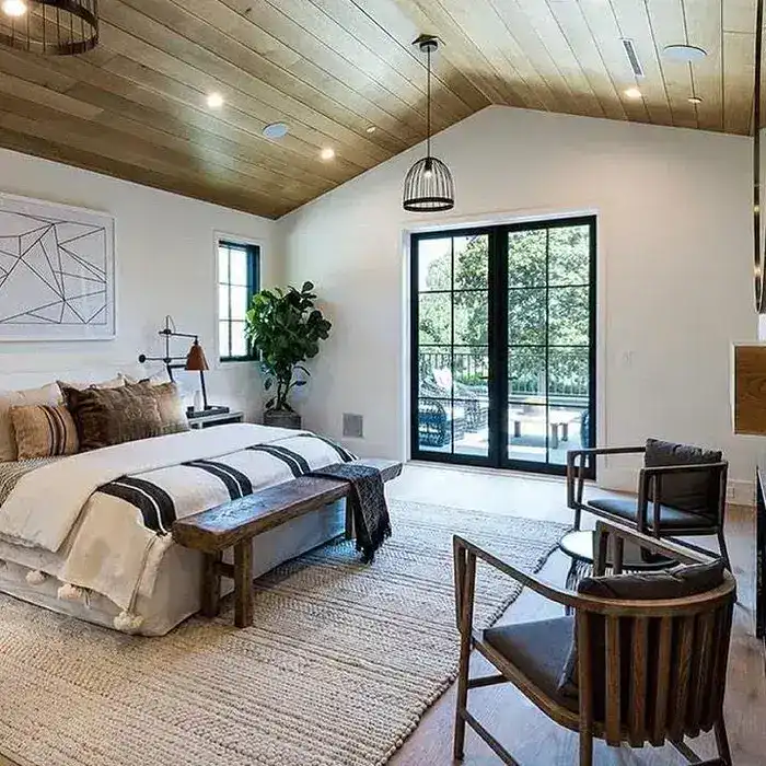 bedroom with wooden beam ceiling