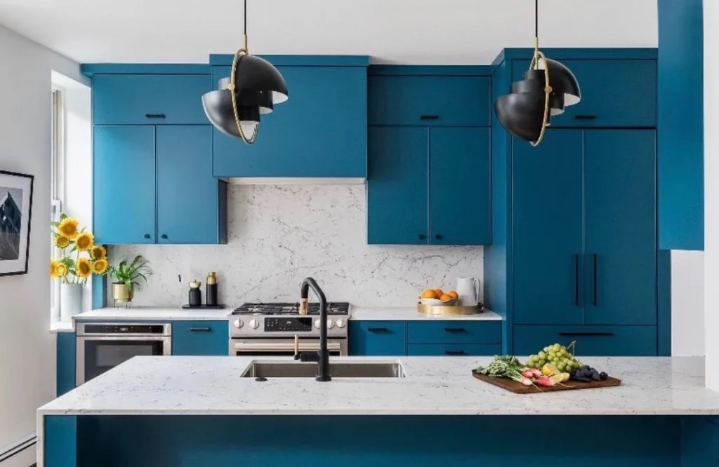 kitchen with blue cabinet and black fixtures
