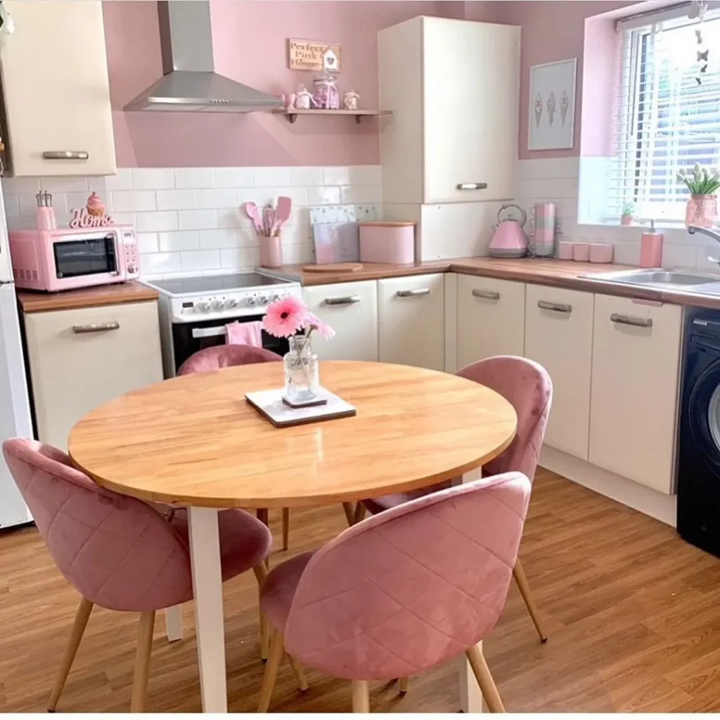 Kitchen with light pink color and round coffee table