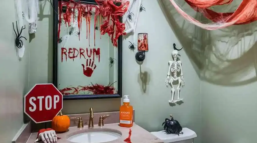 bathroom mirror with redrum message and stop sign Halloween bathroom decoration