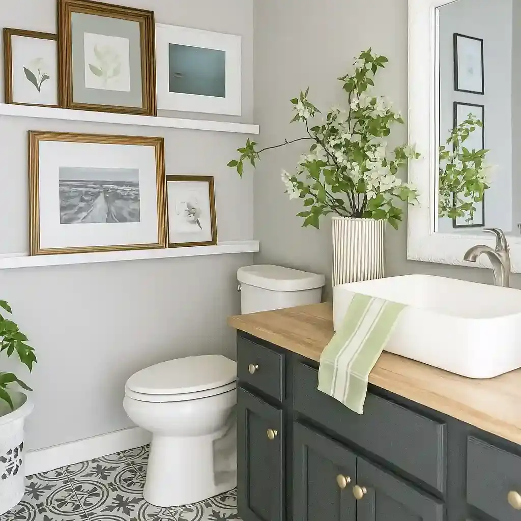 neutral bathroom with fresh branch cutting in the vase