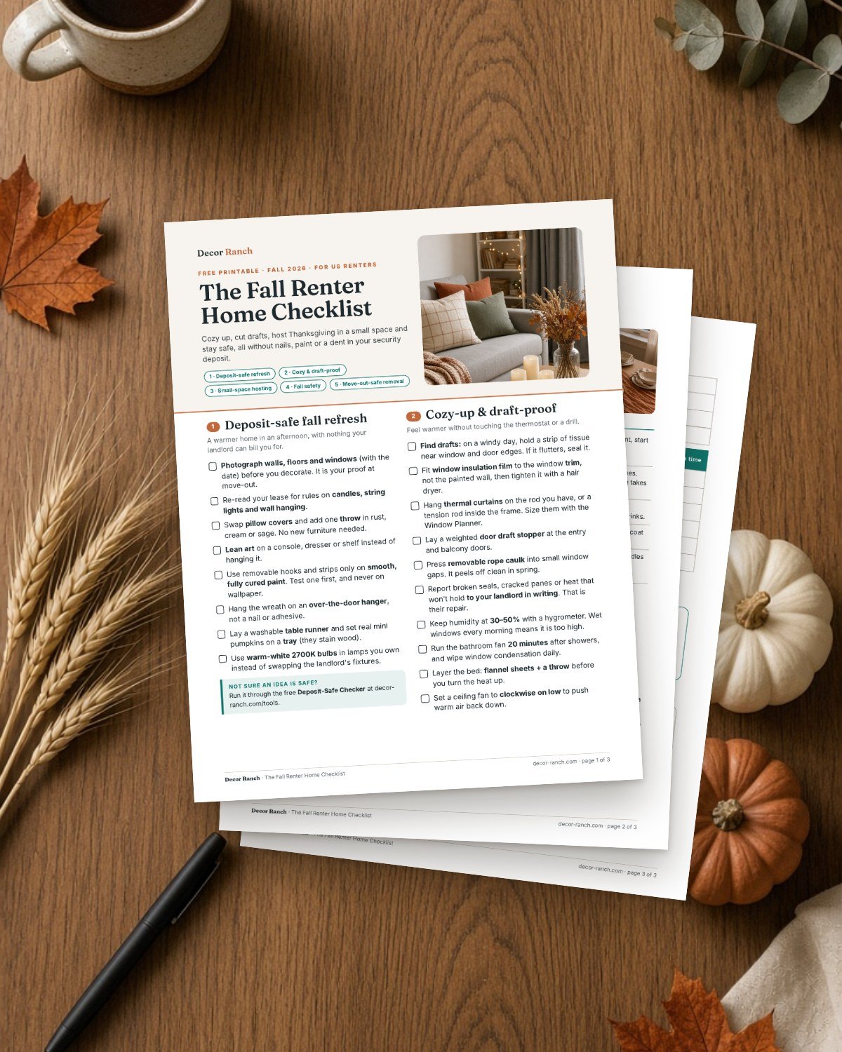 The three pages of the Fall Renter Home Checklist on an oak table with pumpkins, wheat and a mug of coffee